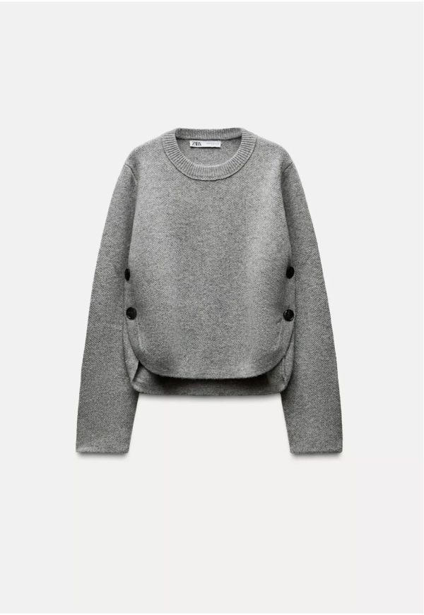 Jersey punto botones laterales Zara