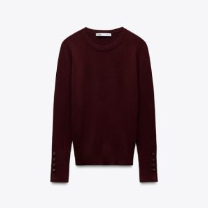Jersey detalle botones dorados Zara